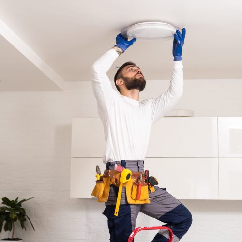 Electrician,Mounting,Ceiling,Lamp,-,Installing,The,Wires.